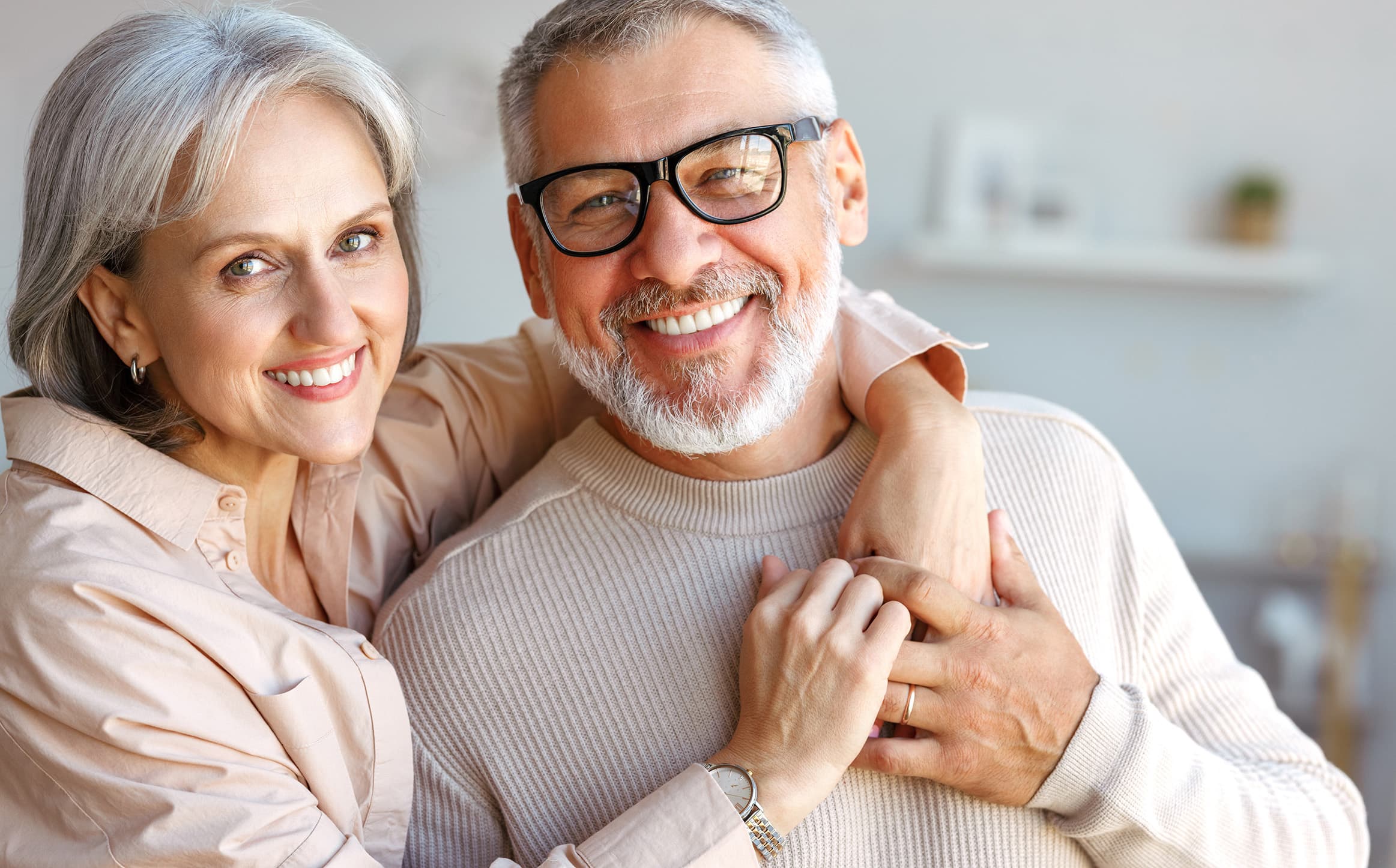 Patient smiling with Invisalign clear aligners